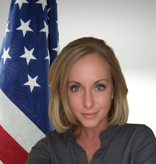 Candi Spitz of Project Lifesaver in front of American flag